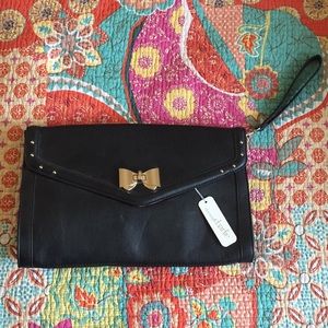 Stylish black clutch with bow Charming Charlie